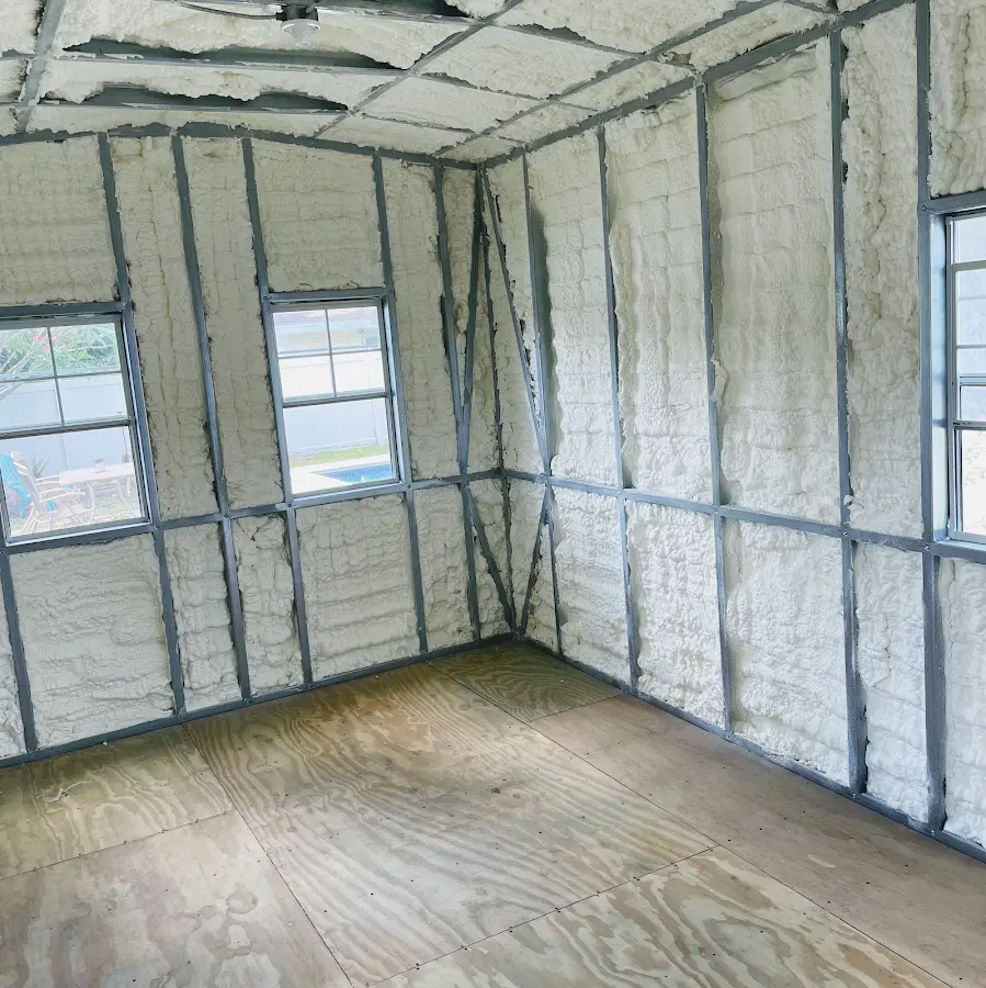 Closed-cell spray foam insulation applied to wall cavities in a residential project in White Oak